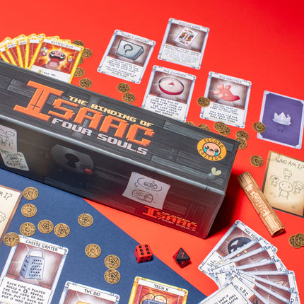 The Binding of Isaac Four Souls 2nd Edition box with cards, coins and dice - House of Games